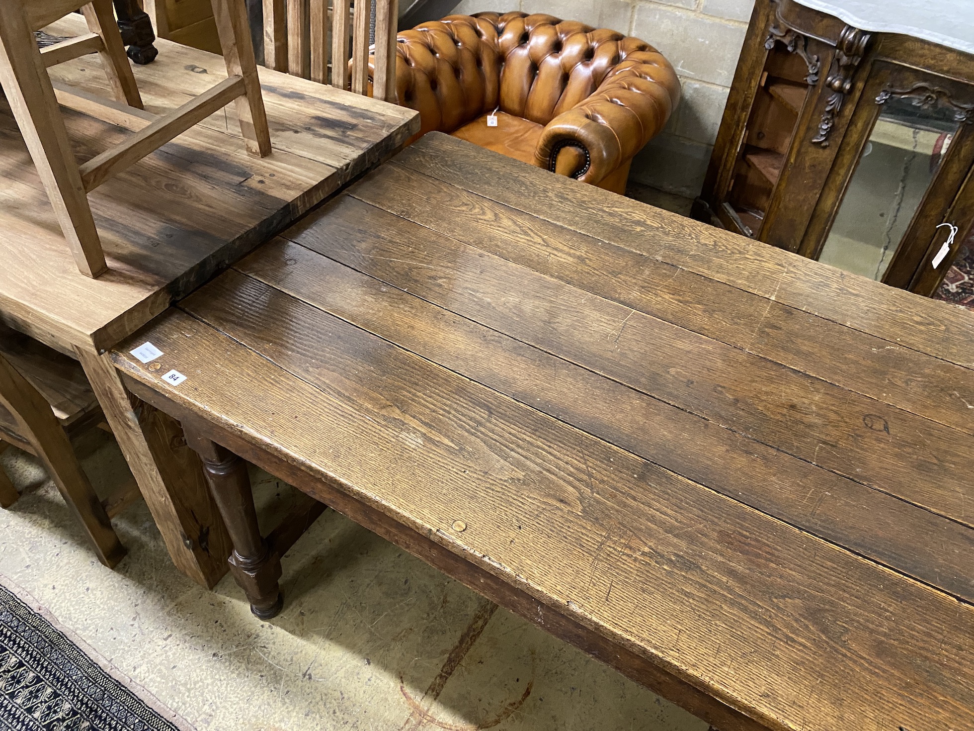 A rectangular oak refectory dining table, length 183cm, depth 87cm, height 76cm